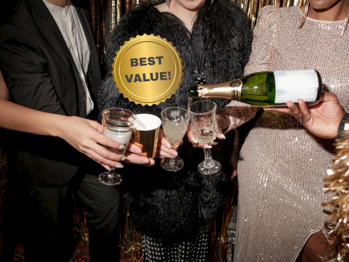 Three people toast drinks at a party, with a &ldquo;BEST VALUE!&rdquo; badge overlay and a bottle being poured.